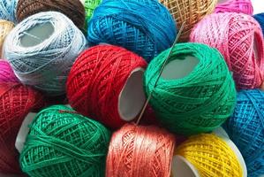 Bright colored yarn balls background photo