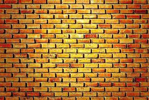 Orange brick wall texture for background use photo