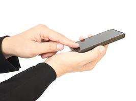 A business mas hands is using - pushing mobile phone. Photo is isolated over white and included clipping path.