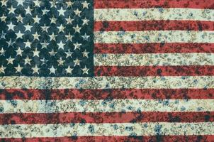 USA flag overlay on old rusty wall surface texture for background use photo