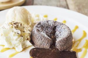 Chocolate lava cake in white plate photo