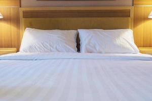 White cloth bedding set in clean modern hotel photo