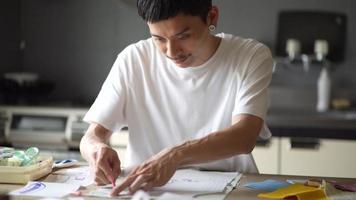 A man marking a cloth video