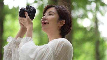 Woman taking a picture video