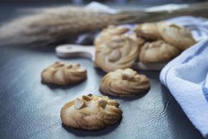 Cookies bakery over blue table background photo