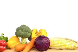 Fresh vegetables over white background photo