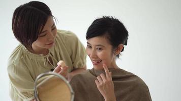 Woman doing make-up video