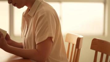 Image of a woman reading video