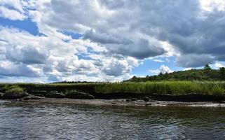 Beautiful Fluffy Clouds Over North River on South Shore photo