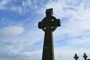 Silhouetted Celtic Crosses in Ireland photo