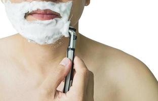 Man is using shaver photo