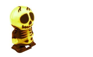 Skeleton toy for Halloween decoration isolated over white photo