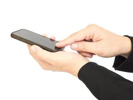 A business mas hands is using - pushing mobile phone. Photo is isolated over white and included clipping path.