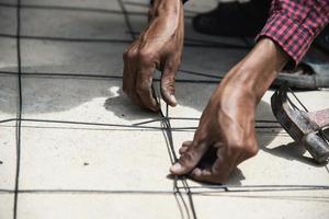 Construction worker are tying up the structural steel, floor concrete pouring preparation photo