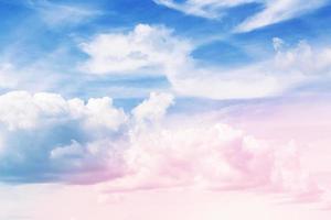 Blurred background. Blue sky and white fluffy clouds. photo