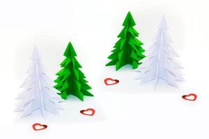origami christmas tree isolated on white background photo