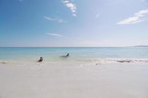 Beautiful Thai beach with kids photo