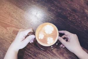Vintage coffee with Latte art decoration photo