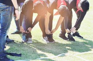 juego de fiesta al aire libre de carrera de cinco patas, concepto de unidad armoniosa foto