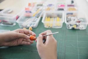 Boy is playing polymer clay photo