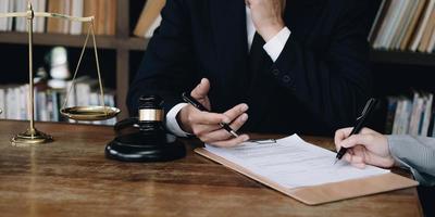 Group of business people and lawyers discussing contract papers ,Consultation between a male lawyer and businessman concept photo