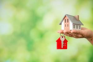 house and keys with bokeh background photo