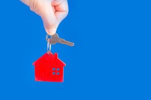 house keys on blue background photo