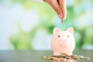 pink piggy bank with bokeh background photo