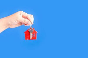 house keys on blue background photo