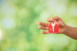 house and keys with bokeh background photo