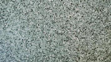 The cement wall was weathered, the surface was scratched, the surface was scratched and damaged. For a mysterious retro-conservative background. photo