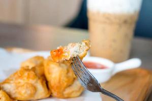 fried chicken on wooden plate photo