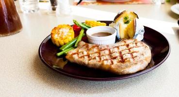 pork chop on plate photo