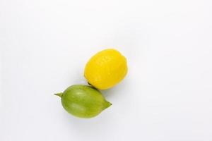Natural green and yellow Lemon fruit isolated on white background photo