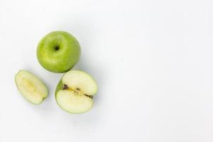 Set of Sliced Fresh Green Apple Isolated on White Background photo