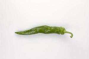 green chili pepper isolated on a white background, Healthy green Vegetables for healthy photo