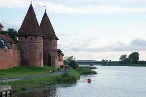 Towers at the main entrance of Malbork castle. Poland photo