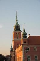 Beautiful red builiding at Castle square, Warsaw photo