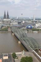 Hohenzollern Bridge and Cologne Cathedral in Cologne, Germany photo