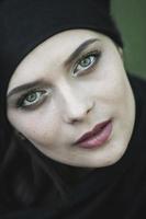 Portrait of a beautiful muslim woman. Young arabian woman in hijab. photo