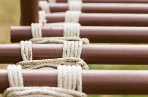 Rope knot around metal pipe photo