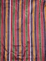 The loincloth has a multicolored pattern. Is a traditional fabric pattern of Thailand Popular with men photo