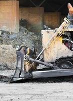 Bulldozer working in workplace photo