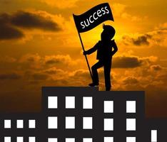 Concept skyline ,Man with success flag standing on the top of building photo