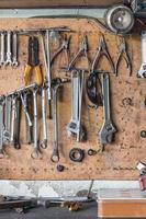 Tool shelf against a wall photo