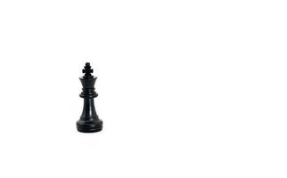 Black chess pieces on white photo