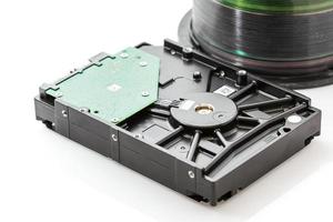 unidad de disco duro y discos compactos foto