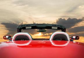 The red car with sunset photo