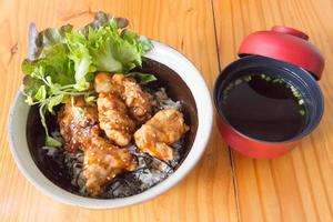 Fried chicken rice with sauce. japanese food photo