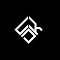 diseño de logotipo de letra udk sobre fondo negro. udk creative iniciales carta logo concepto. diseño de letras udk. vector